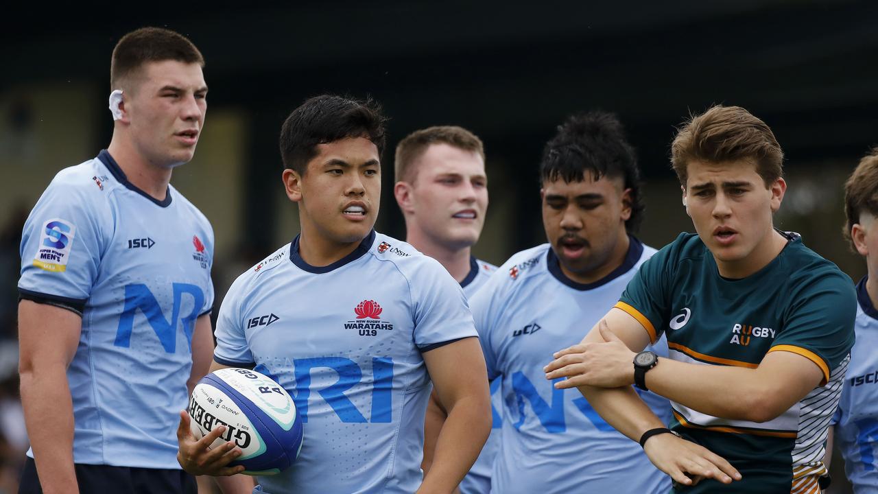 The NSW Waratahs suffered their first loss of the season on a wet and windy day. Pictures: Karen Watson/Rugby Australia.