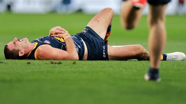 Taylor Walker was slow to get up after a collision with Daniel Rich. Picture: Daniel Kalisz/Getty Images