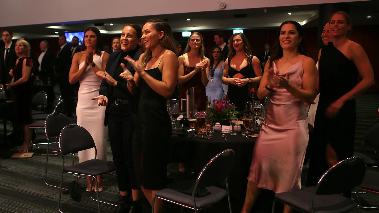 Players and guests applaud the winner of the Best and Fairest during the 2021 AFLW W Awards at The Gabba on April 20, 2021 in Brisbane, Australia. (Photo by Jono Searle/Getty Images)