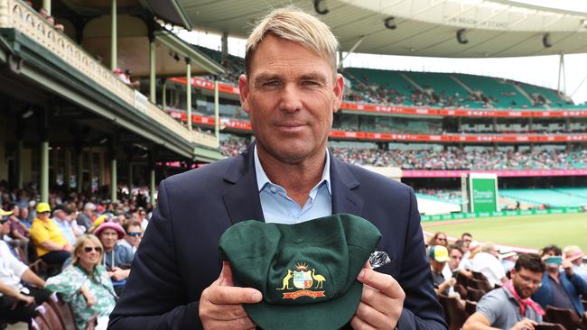 Australian cricket legend Shane Warne sold his baggy green to raise money for fire devastated fires. Picture: Brett Costello