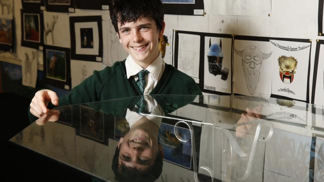 Marsden High student Alex Hawkins, 13, with his entry to the Ryde Council Sustainable Waste to Art Prize.