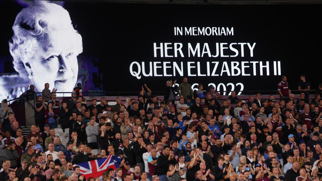 Football fans paid their respects. Photo by Marc Atkins/Getty Images