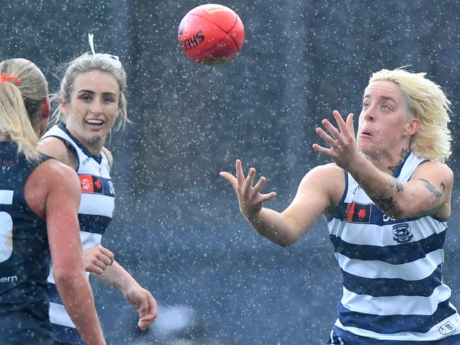 MELBOURNE, AUSTRALIA - SEPTEMBER 14: Gabbi Featherston of the Cats marks during the round three AFLW match between Carlton Blues and Geelong Cats at Ikon Park, on September 14, 2024, in Melbourne, Australia. (Photo by Josh Chadwick/AFL Photos/via Getty Images)