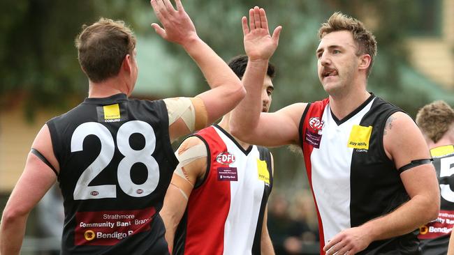 Lynden Dunn celebrates one of his three goals with teammate Liam Bowkett. Picture: Hamish Blair