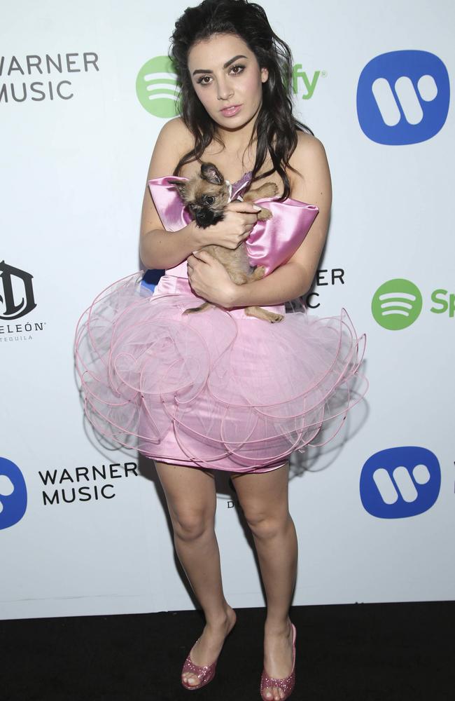 Charli XCX brought her pooch to the Warner Music Group Grammy Celebration.