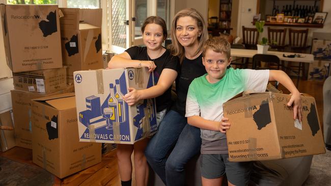 Tina Gunter with her kids, James, 8, and Olivia, 10. Investing to give them a bright future will now be something the family does interstate. Picture: Jason Edwards.