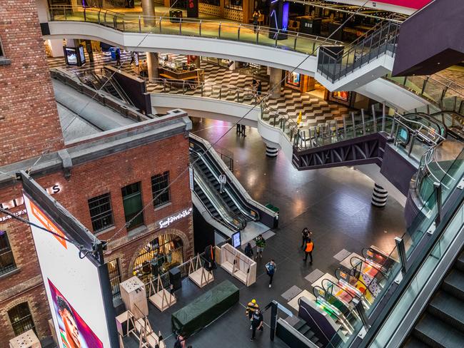 MELBOURNE, AUSTRALIA - MARCH 29: A near empty Melbourne central shopping mall on March 29, 2020 in Melbourne, Australia. All international arrivals into Australia from midnight on Saturday will be placed into mandatory quarantine in hotels for 14 days as the Federal Government increases restrictions to stop the spread of COVID-19.  All libraries, museums, galleries, beauty salons, tattoo parlours, shopping centre food courts, auctions, open houses, amusement parks, arcades, indoor and outdoor play centres, swimming pools are closed and indoor exercise activities are now banned. This is in addition to the closure of bars, pubs and nightclubs which came into effect on Monday. Restaurants and cafes are restricted to providing takeaway only. Weddings will now be restricted to five people including the couple while funerals are limited to 10 mourners. All Australians are now expected to stay at home except for essential outings such as work, grocery shopping and medical appointments. Exercising outdoors alone is still permitted. Australia now has more than 3,600 confirmed cases of COVID-19 while the death toll now stands at 16. (Photo by Asanka Ratnayake/Getty Images)