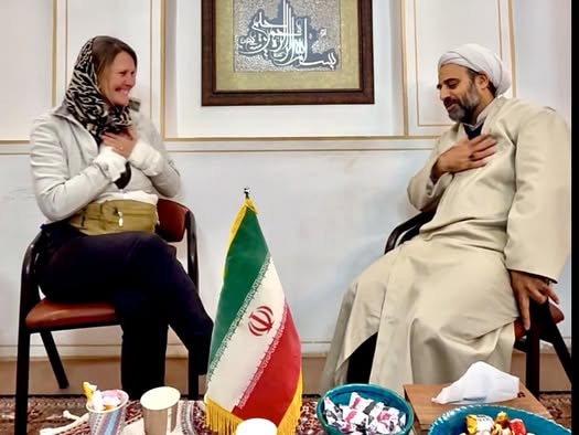 Lindsay meeting a mullah, at the Madrasa Naseriyeh in Isfahan