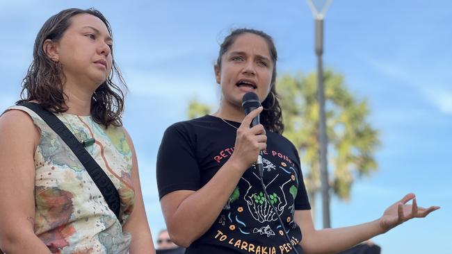 Cyan and Laniyuk, a Larrakia, Kungarakan, Gurindji and French political creative, speaking at a protest against Middle Arm ahead of the second day of public hearings about the proposed development in Darwin. Picture: Fia Walsh.