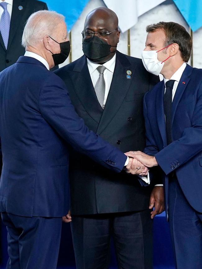 US President Joe Biden shakes hands with French President Emmanuel Macron. Picture: AFP