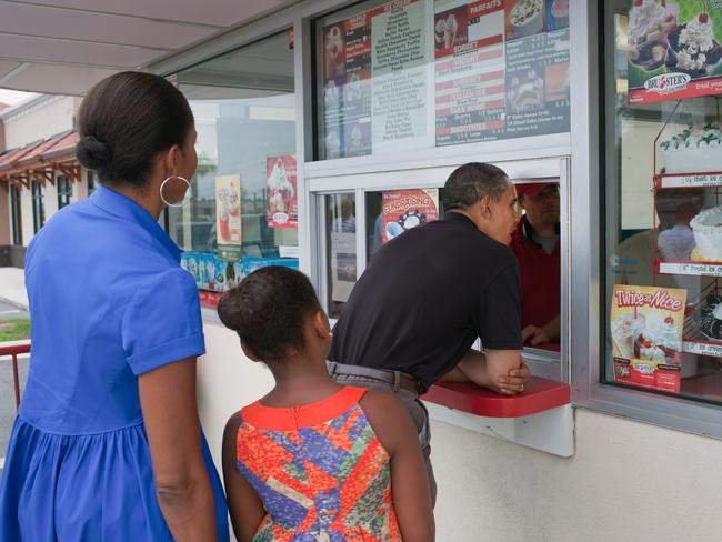 President Barack Obama, First Lady Michelle Obama, and daughter Sasha order ice cream at Bruster’s in Panama City Beach on August 15, 2010 Picture: Pete Souza/The White House