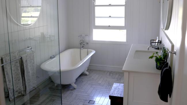 The clawfoot bath tub has been restored to its former glory. Photo: Steve Pohlner.
