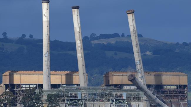 The station’s eight chimneys remained mostly intact until hitting the ground. Picture: AAP