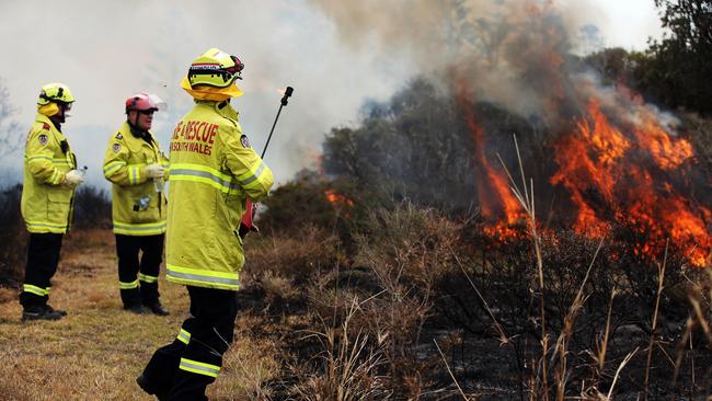 Fire and Rescue NSW performs a a controlled burn to protect the township of Wallabi near Taree. Picture: Jane Dempster