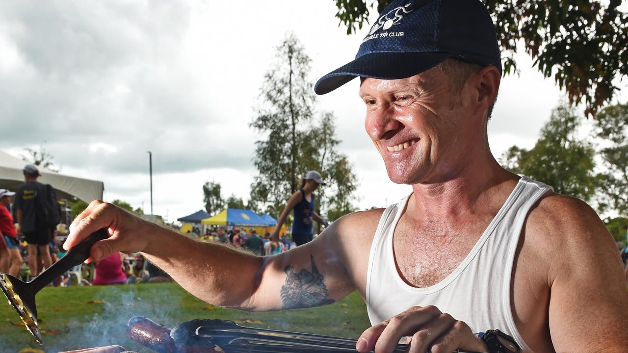 Steven Gibbs of Bushland Beach cooks up and Australian Day breakfast. Picture: Zak Simmonds