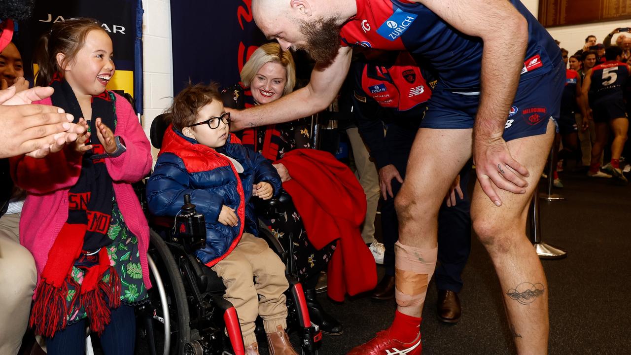 MMax Gawn greets young Demon fan Charlie. Picture: Michael Willson