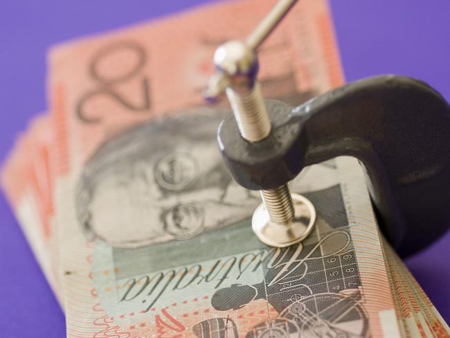 Australian dollars In Vice. Pic supplied by Thinkstock.