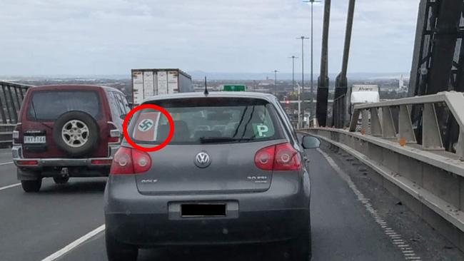 A Melbourne P-plater has been snapped displaying a large Nazi swastika in their rear window while driving across the West Gate Bridge.