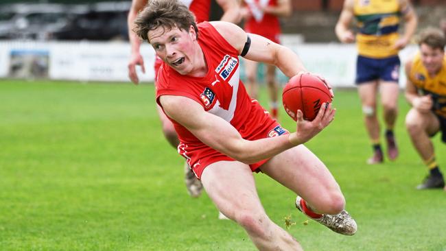Ewan Mackinlay in action for North Adelaide. Picture: Brenton Edwards