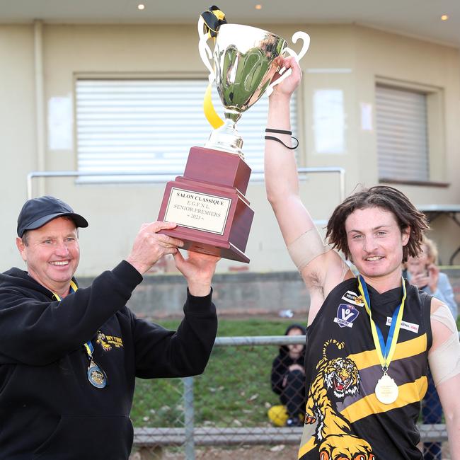 Wy Yung coach Rod Bills and captain Jock Overend with the East Gippsland league premiership cup. Picture: Yuri Kouzmin