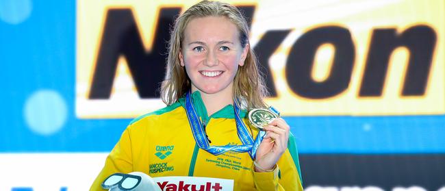 Ariarne Titmus with her short course gold medal after breaking a world record last December in China. (Photo by Lintao Zhang/Getty Images)