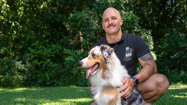 Derek Williams with seven-month-old Australian shepherd Ragnar, voted FNQ’s cutest dog. Picture Emily Barker.