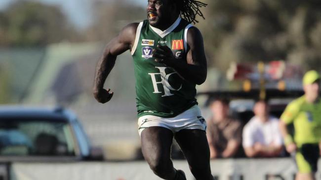 Anthony McDonald-Tipungwuti runs in the qualifying final.  Picture: Rita Morello.