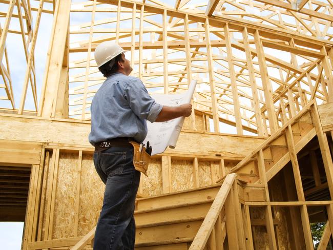 A construction worker focusing on the future has his head screwed on properly.