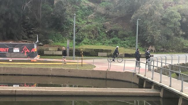 People still make the most of a morning cycle or walk along the Parramatta River.