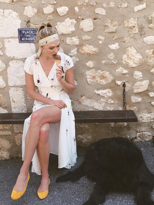 Karlie Kloss eats her meal for the week and considers sharing it with her dog... 