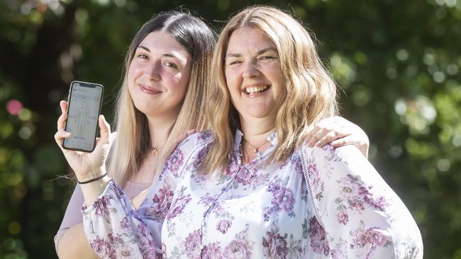 Robyn and Musolino and her daughter Alysha looked at a new skin cancer app that can detect the most common signs of skin cancer with up to 95 per cent accuracy in less than a minute. Picture: Rob Leeson.