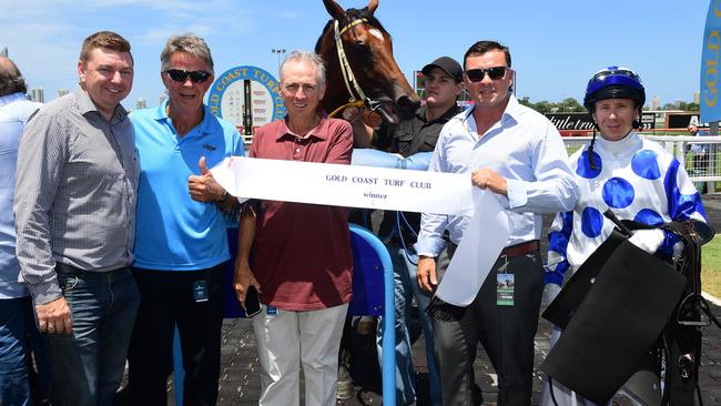 Jockey Paul Hammersley rode the Bryan and Daniel Guy-trained Junction to victory in the QTIS 2YO Maiden Plate (1200m) at the Gold Coast. Daniel Guy (red shirt) has shares in the horse. Picture: Grant Peters, Trackside Photography.