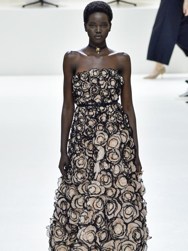 Akech walks the runway at Paris Fashion Week. Picture: Getty Images