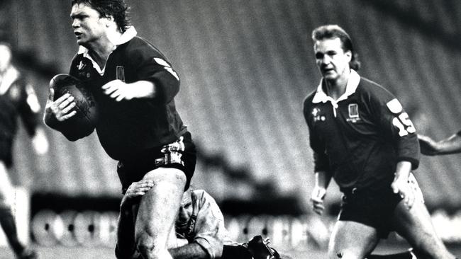 Paul Vautin is tackled by Peter Sterling during Game 1 of the NSW v Queensland State of Origin series at the SFS in Sydney 17/05/1988.