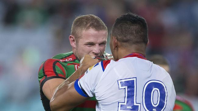 Daniel Saifiti locks horns with Tom Burgess at ANZ Stadium. Picture: AAP