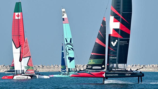 (L-R) Canada, US and Swiss SailGP sail during a training session.