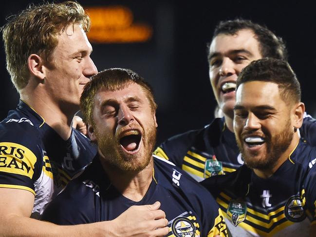 Ben Spina celebrates his try for The Cowboys during the NRL Rugby League match between the Vodafone Warriors and The North Queensland Cowboys at Mt Smart Stadium, Auckland, New Zealand. Saturday 22 August 2015. Copyright Photo: Andrew Cornaga / www.Photosport.nz