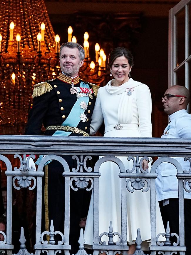 Her Majesty Queen Mary looked ethereal in a simple, white, form-fitting dress with a jewelled belt. Picture: Martin Sylvest Andersen/Getty Images