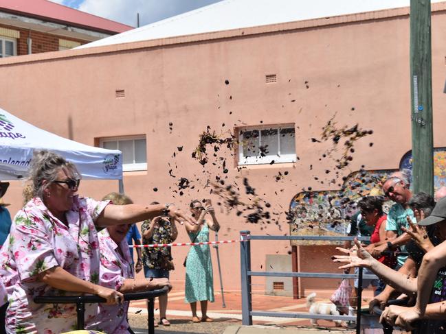 It didn't take long for the first grapes to be thrown at the Apple and Grape Festival grape crush, March 1, 2024