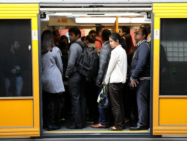 Overcrowded Trains from Parramatta to Central.Female Passenger trying to board a  crowded train at Parramatta station.