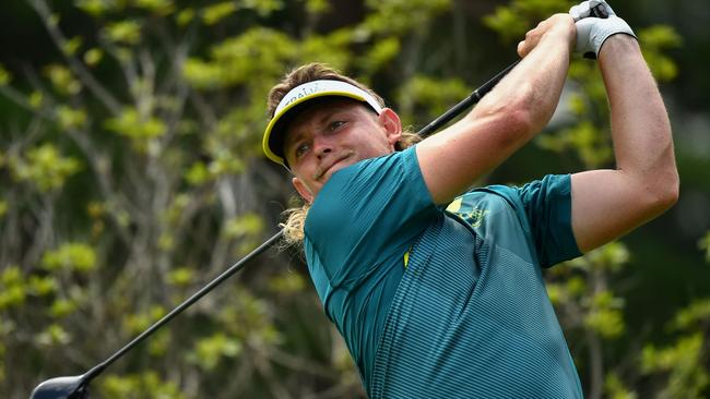 Australia’s Cameron Smith watches his drive from the 9th tee during the second round of men’s golf action at the Tokyo Olympics. Picture: AFP