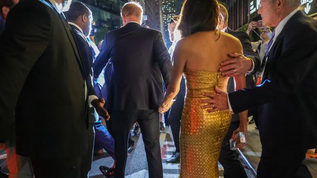 Harry held his wife’s hand as he led her through the photographers. Picture: Selcuk Acar/Anadolu Agency via Getty Images