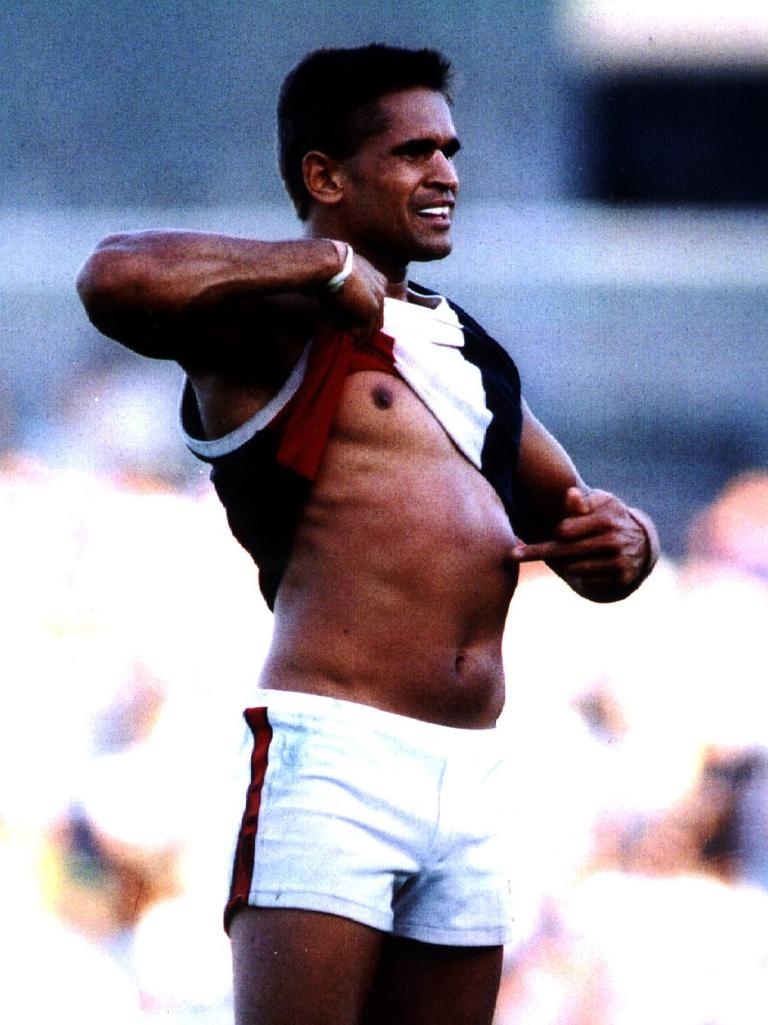 Neil (Nicky) Winmar lifts his jumper and proudly shows off his skin colour after being vilified by Magpie fans during a St Kilda v Collingwood AFL game 26/04/1993.