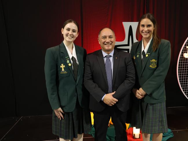 St Joseph's College Stanthorpe school captains Taylah Organ (L) and Hannah Widderick (R) with principal Andrew Kendall OAM at their awards night. Photo: Supplied