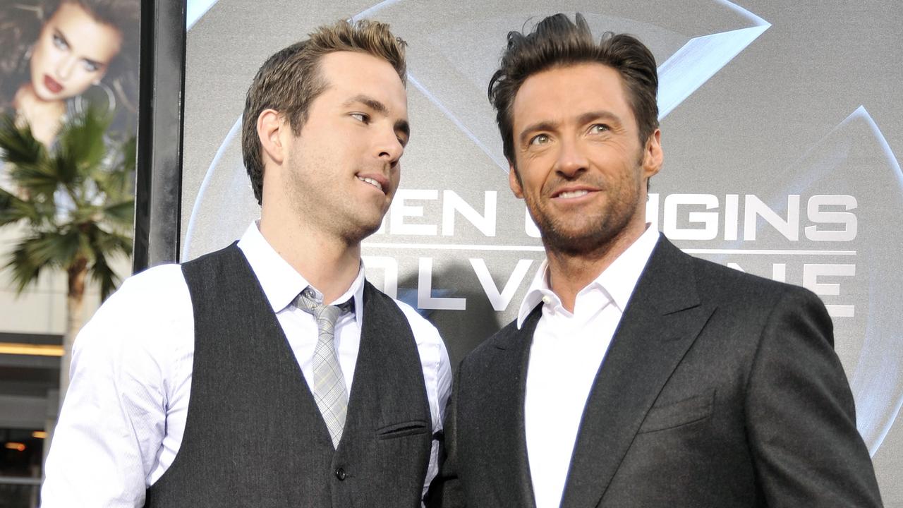 Ryan Reynolds and Hugh Jackman have continued their fake feud, but now John Krasinski is involved. Picture: Kevin Winter