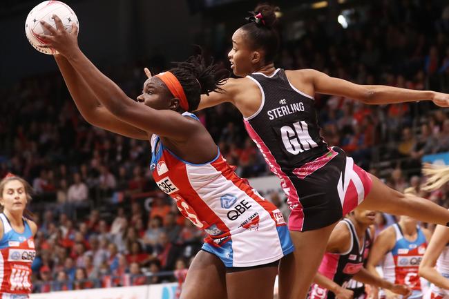 Swifts Sam Wallace is challenged by Adelaide’s Shamera Sterling in the round two Super Netball at Quay Centre. Picture: Matt King/Getty