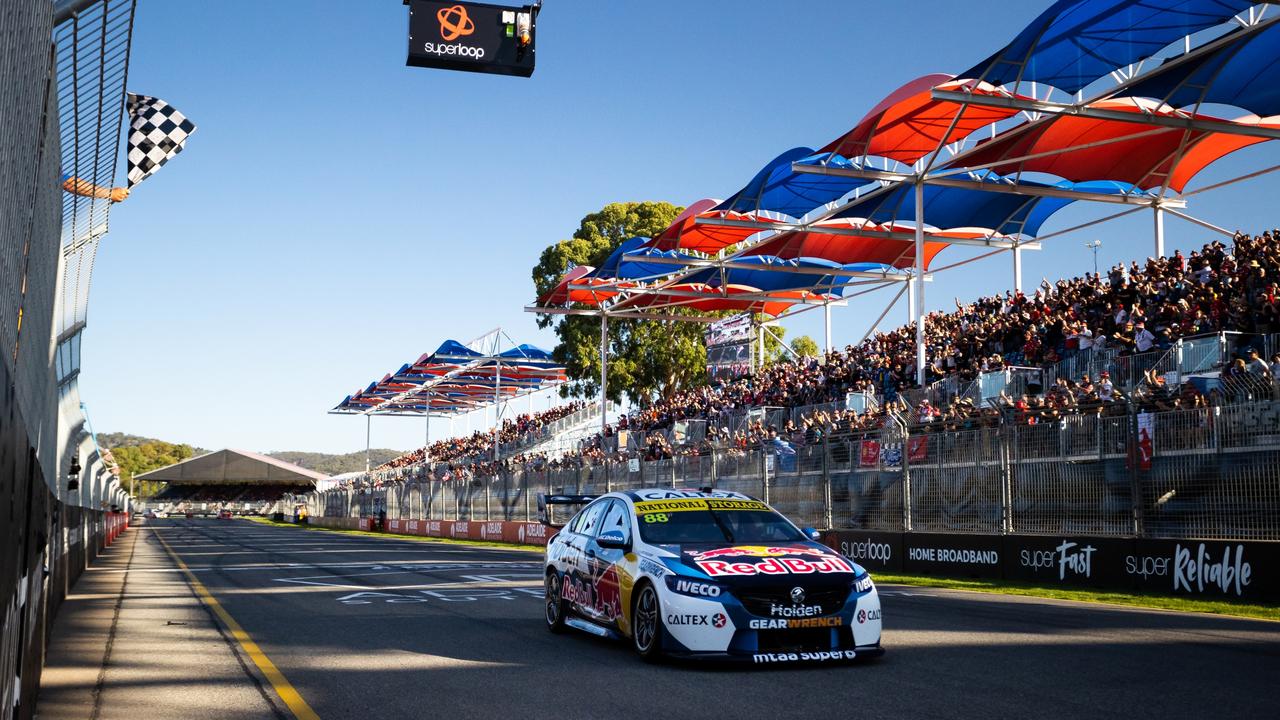 Jamie Whincup takes the chequered flag in Adelaide in February 2020. Picture: Daniel Kalisz/Getty Images