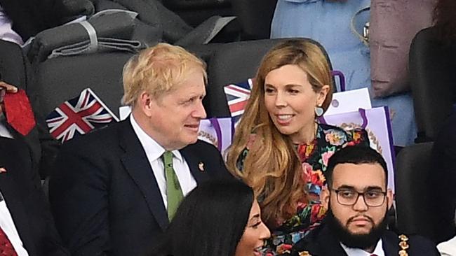 Britain's Prime Minister Boris Johnson and his wife Carrie Johnson take their seats for the Platinum Party at Buckingham Palace. Picture: AFP