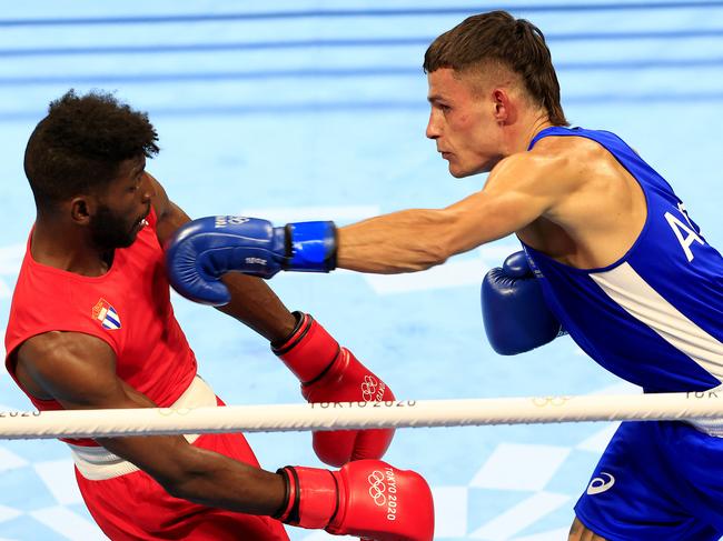 Harry Garside (right) took on Andy Cruz of Cuba in the 2020 Tokyo Olympics. Picture: Adam Head