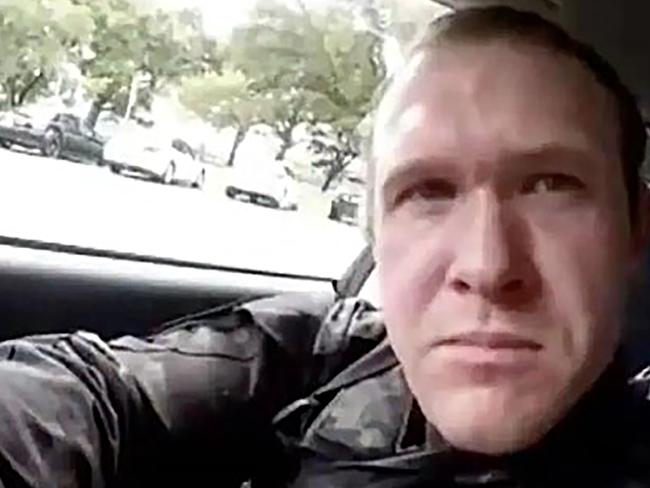 TOPSHOT - This image grab from a self-shot video that was streamed on Facebook Live on March 15, 2019 by the man who was involved in two mosque shootings in Christchurch shows the man in his car before he entered the Masjid al Noor mosque. - A "right-wing extremist" armed with semi-automatic weapons rampaged through two mosques in the quiet New Zealand city of Christchurch during afternoon prayers on March 15, killing 49 worshippers and wounding dozens more. (Photo by Handout / HANDOUT / AFP) / -----EDITORS NOTE --- RESTRICTED TO EDITORIAL USE - MANDATORY CREDIT "AFP PHOTO / HANDOUT" - NO MARKETING - NO ADVERTISING CAMPAIGNS - DISTRIBUTED AS A SERVICE TO CLIENTS - NO ARCHIVES